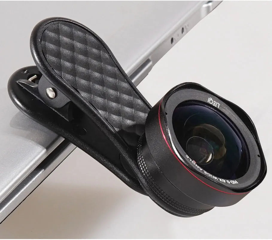 Mobile phone lens kit with 0.6X wide-angle and 15X macro lenses, clip, and storage box
