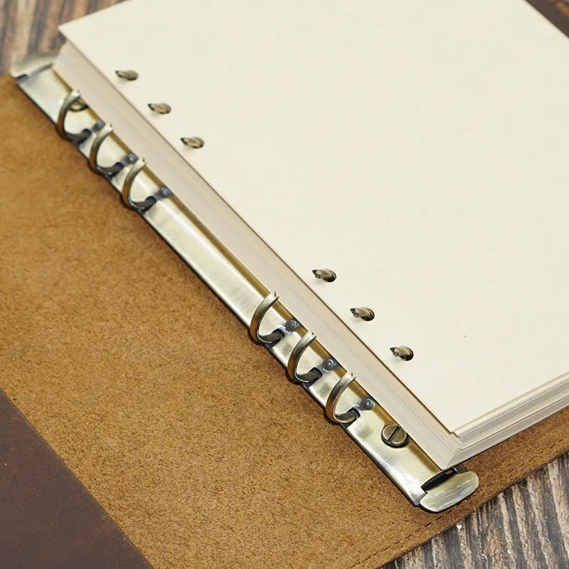 A5 genuine leather binder notebook with 100 sheets of 100gsm kraft paper, 210x140mm, in Crazy Horse Brown, Dark Green or Napa Black.