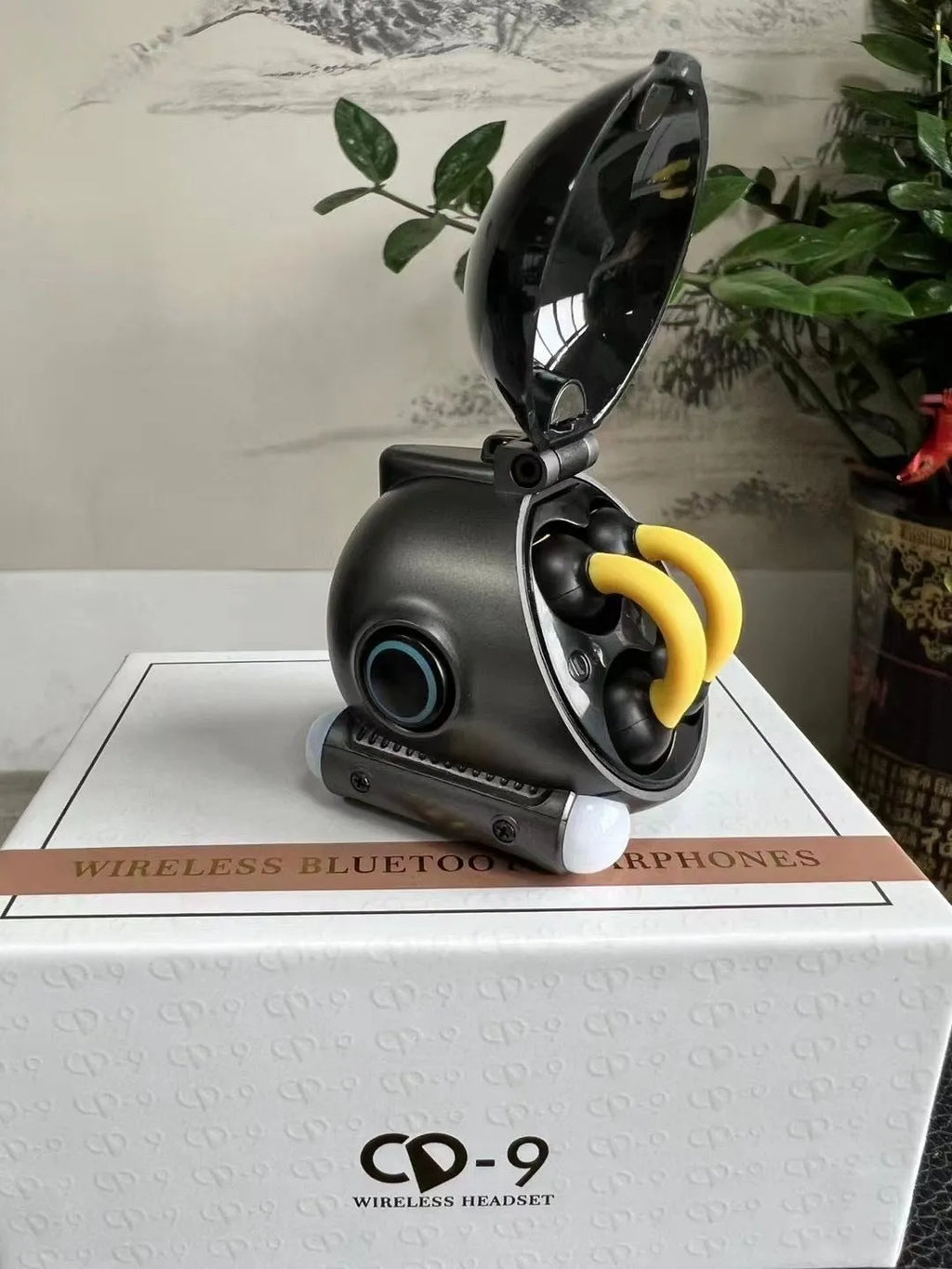 Wireless Bluetooth sports earphones with clip design in black and white colours