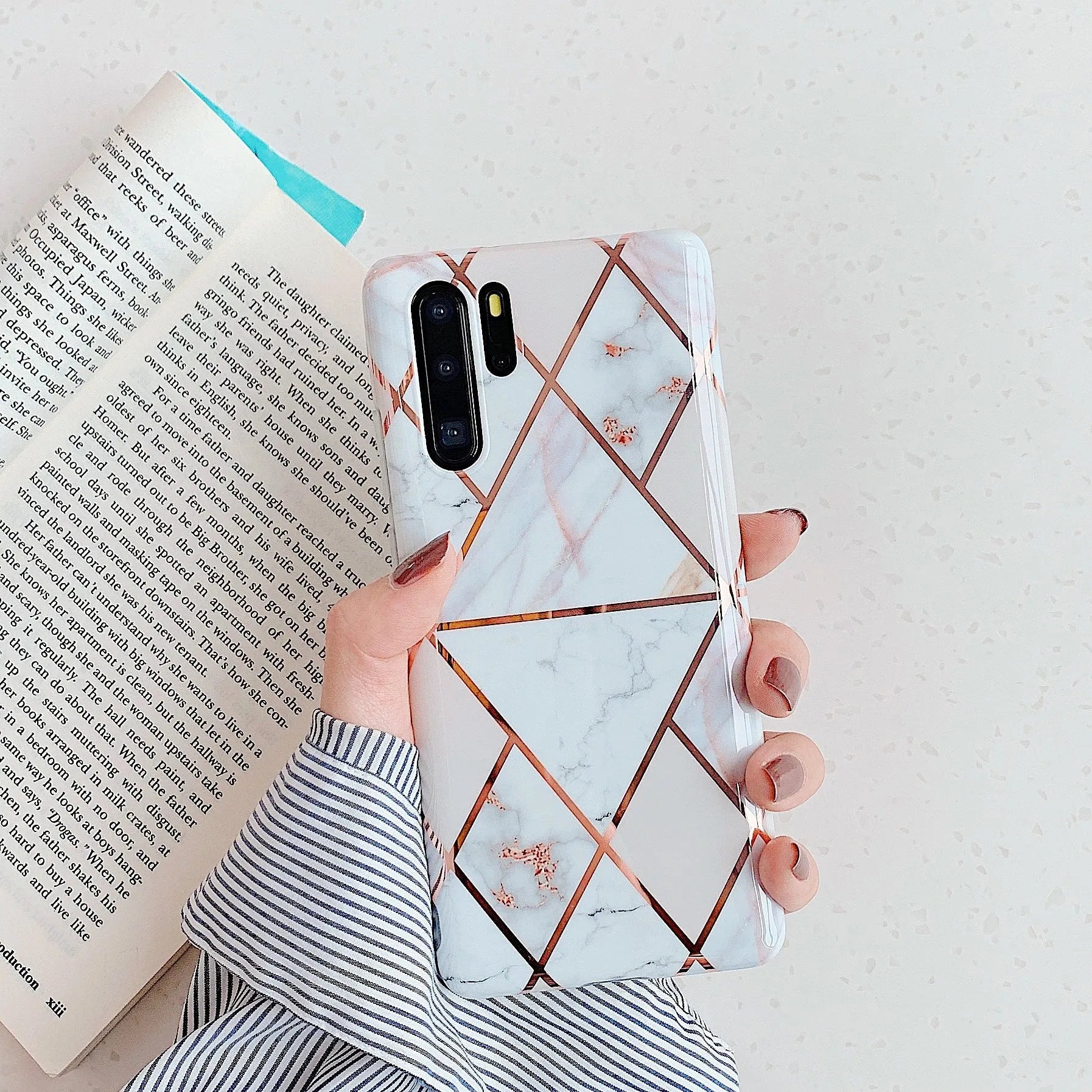 Electroplated marble design phone case for Huawei and Samsung smartphones in various colours.