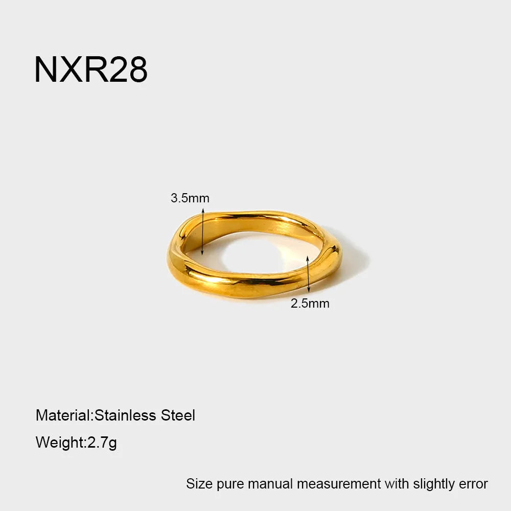 Irregular wave stainless steel ring in colour NXR28 on a plain background, unisex size No 6