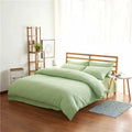 Four-piece polyester bedding set in a modern style for a 2m bed, shown in a choice of colours.