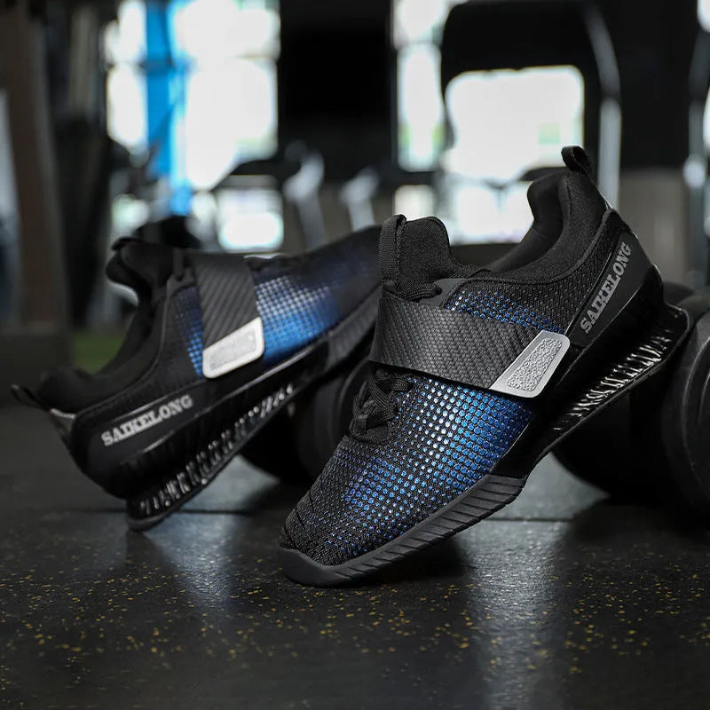 Pair of unisex weightlifting shoes with breathable Oxford cloth upper and non-slip rubber TPU sole, in red or dark blue.