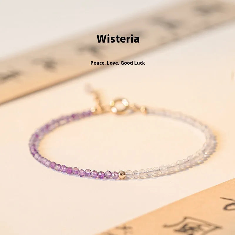 Purple rattan design women's crystal bracelet with geometric cut surface beads