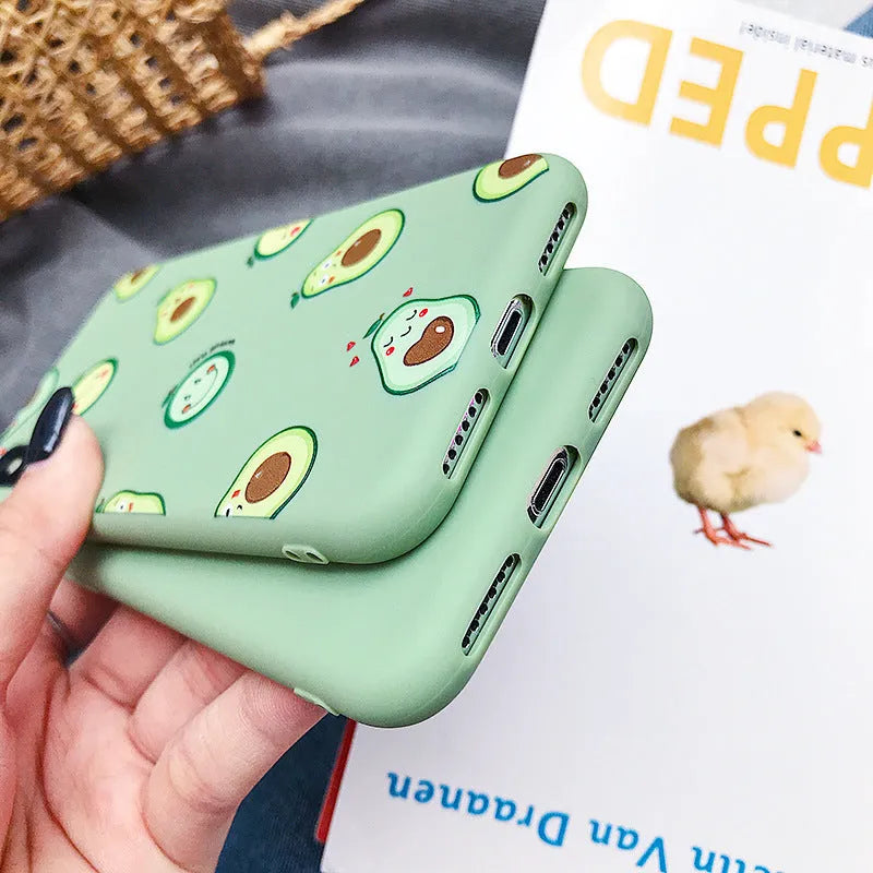 Flexible green TPU iPhone case with a detailed painted cartoon avocado illustration on the back.