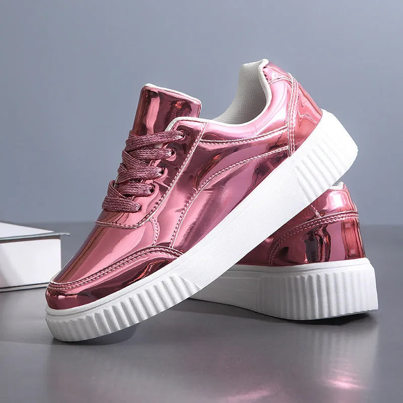 Gold sequin platform sneakers with a round toe and 3-5cm mid heel on a white background