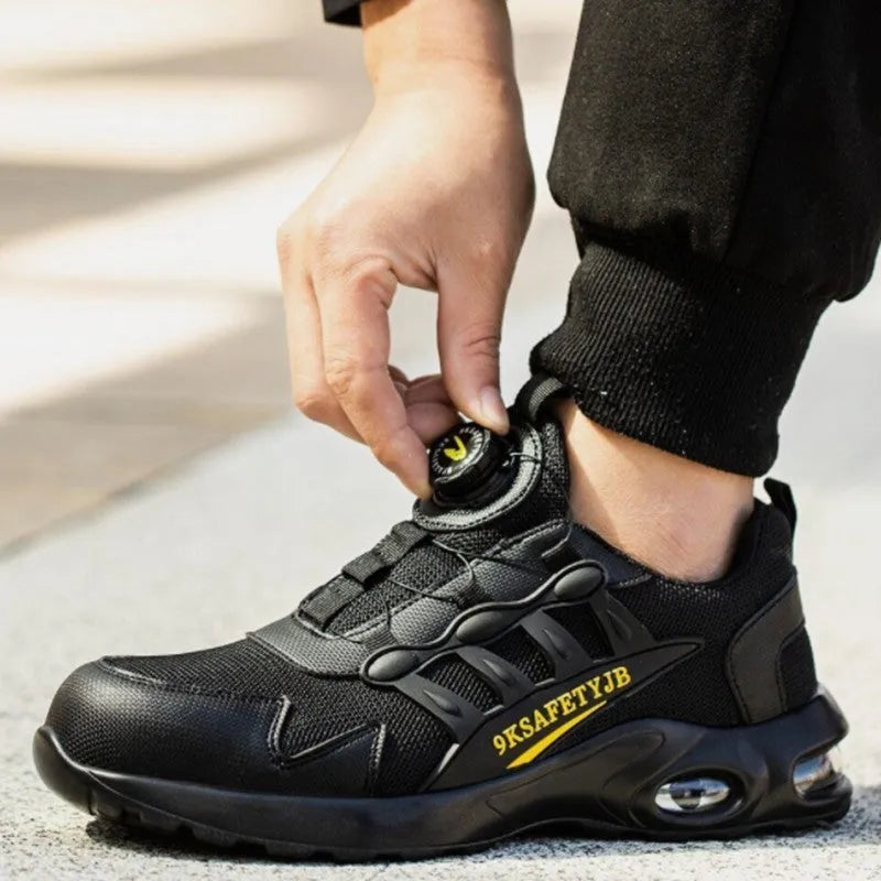 Men's black steel toe anti-puncture safety shoes with suede upper and rubber sole, front lace up closure