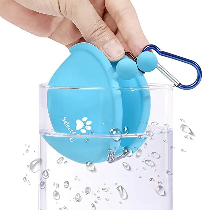 Yellow silicone dog treat pouch with hook and loop closure on a waist belt for portable training treat storage
