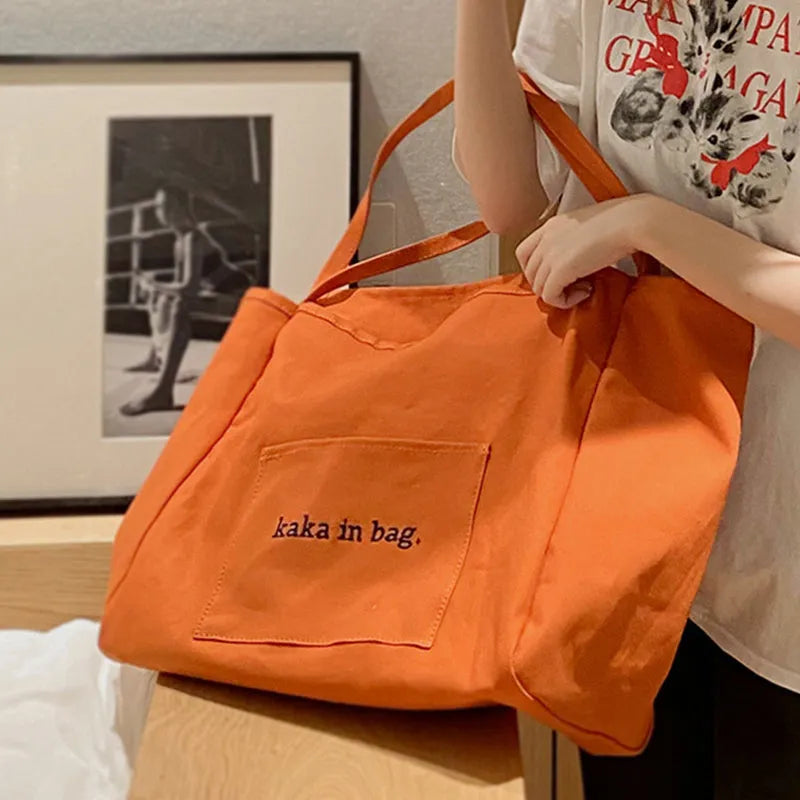 Large capacity canvas shopping tote bag in solid colour, suitable for shoulder carry