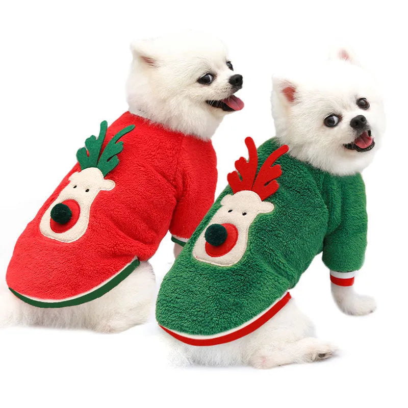 Red coral fleece dog sweater with reindeer hoodie on a small dog over a festive background
