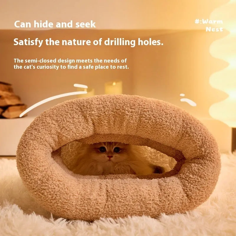Brown semi-enclosed lambswool cat sleeping bag on a wooden floor.