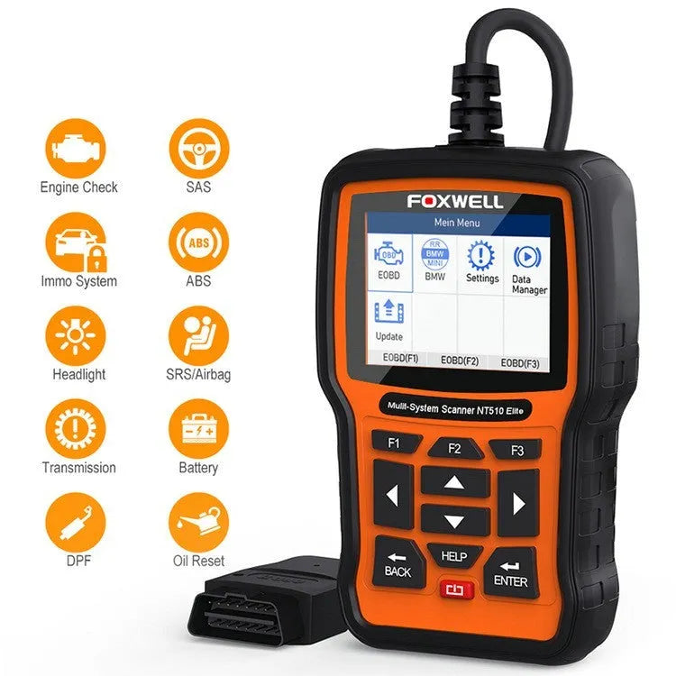 Foxwell NT510 orange and black automotive diagnostic scanner with data cable on a workshop bench