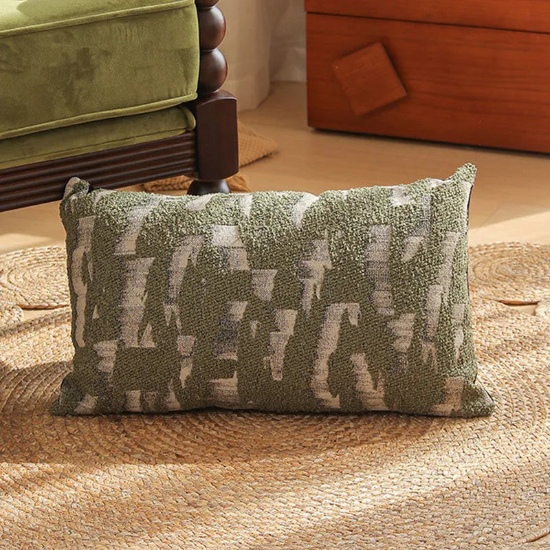 Square 45cm jacquard cushion cover with retro floral pattern in Nordic style on a grey sofa.