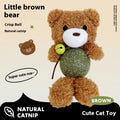 Brown Bear plush cat toy with a green mint ball and a small silver bell attached, shown next to a tape measure indicating 15cm height.