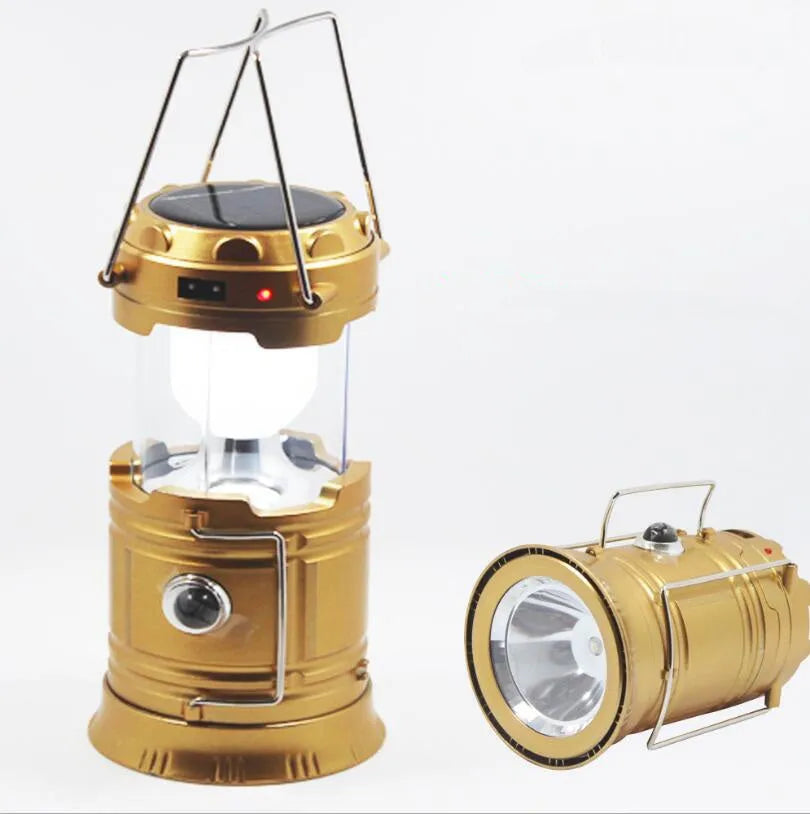 Collapsible LED solar camping lantern in Blue or Gold with reflective lenses, rubber handle and water resistant ABS body