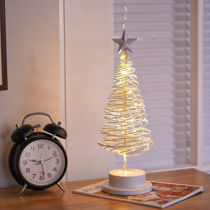 33cm tall wrought iron LED Christmas tree spiral light with warm white lights on tabletop