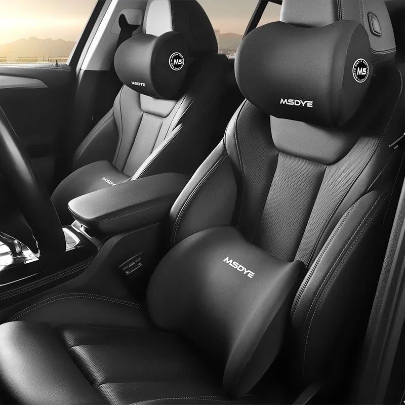 Memory foam car headrest and lumbar support pillow set with milk silk cover in black, showing both pillows.