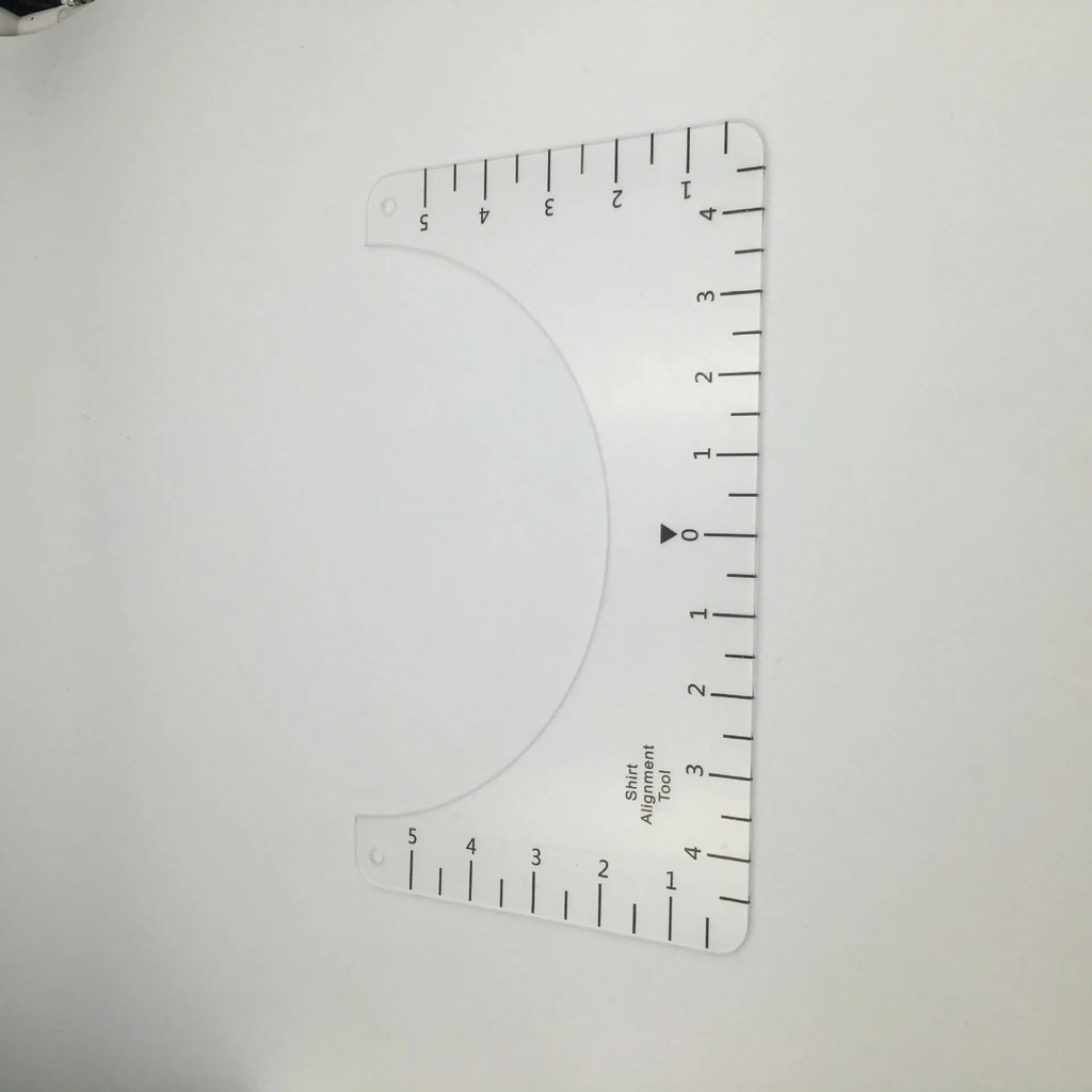 Transparent acrylic sewing ruler measuring 10 by 6 inches for T-shirt patch alignment