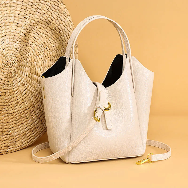 Genuine leather women's hand held retro bucket bag in beige with top handle
