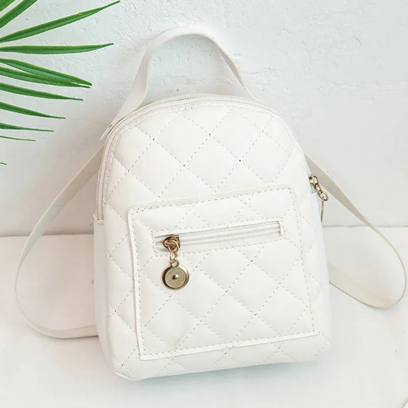 Girls' hard square PU backpack with embroidery in black, white, or pink, showing front and handle.