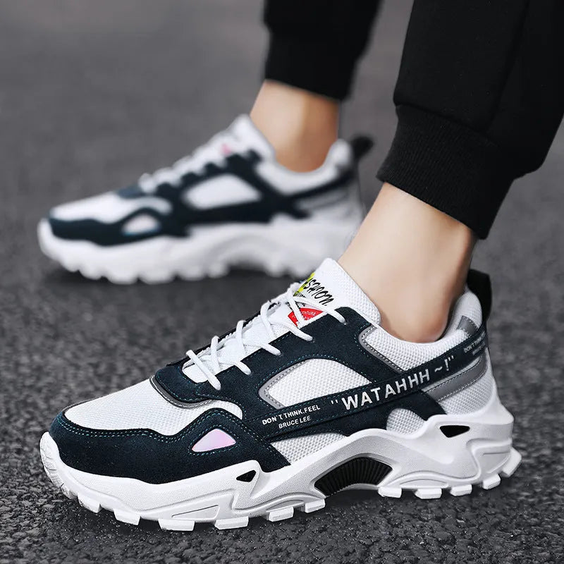 Men's breathable casual sneakers in black white colour-blocked pattern with lace-up front