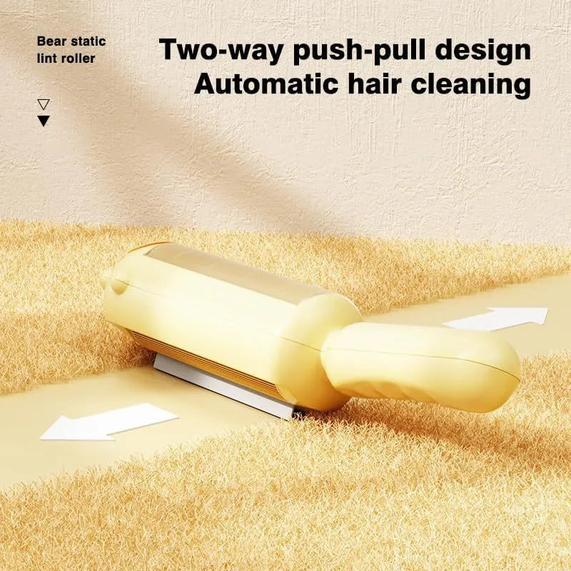 Blue reusable pet hair removal roller with self-cleaning base on a sofa
