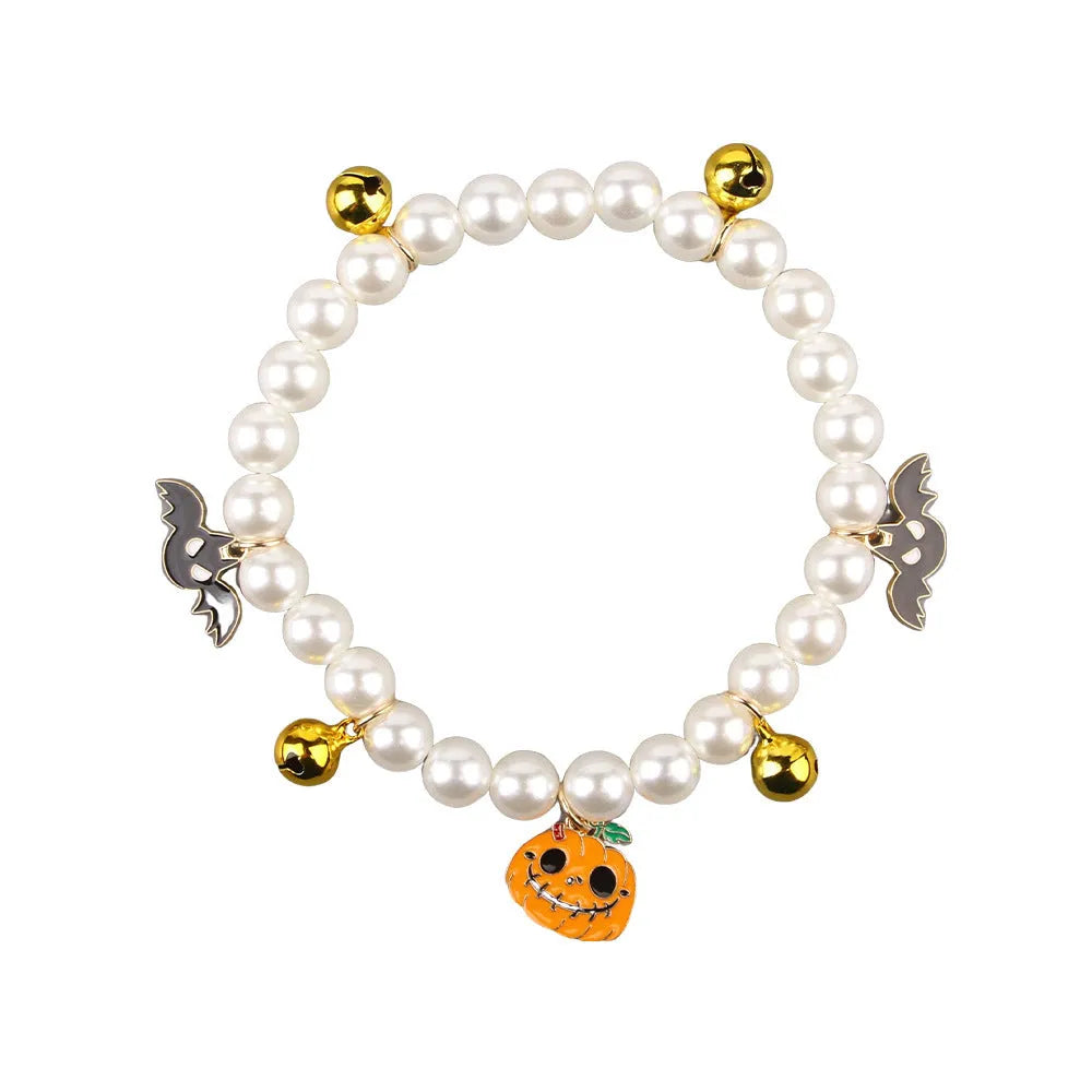 Halloween cat collar with simulated pearl necklace decoration showing three pumpkin design options