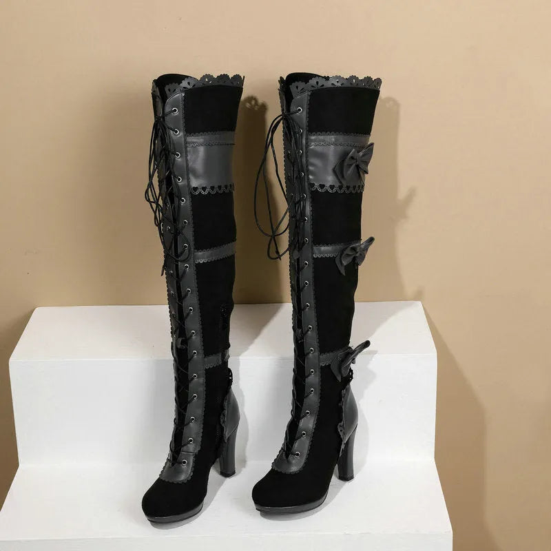 Women's high heel lace strap boots in black with round toe and artificial PU upper