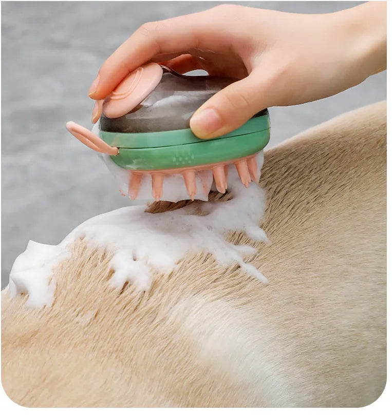 Blue pet bath brush with silicone bristles and shampoo dispenser in handle