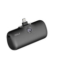 Compact cylindrical lipstick power bank in purple showing digital battery percentage display on one end.