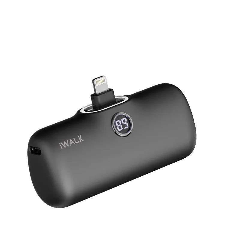 Compact cylindrical lipstick power bank in purple showing digital battery percentage display on one end.