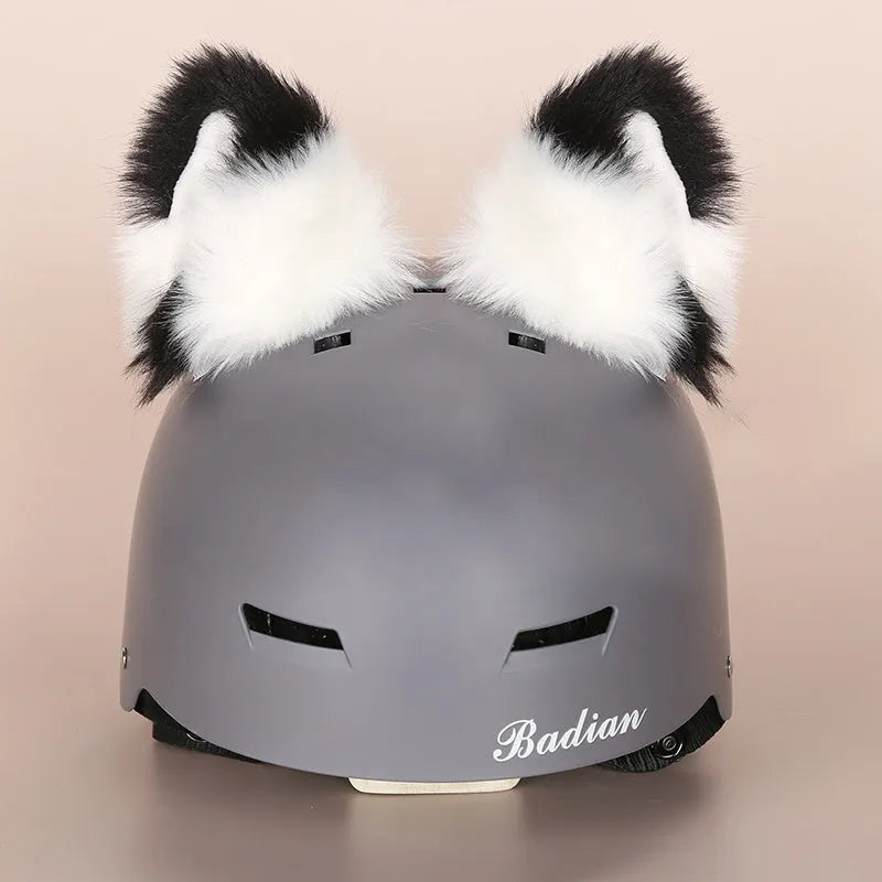 Soft plush cartoon character cover stretched over a pair of black on-ear headphones.