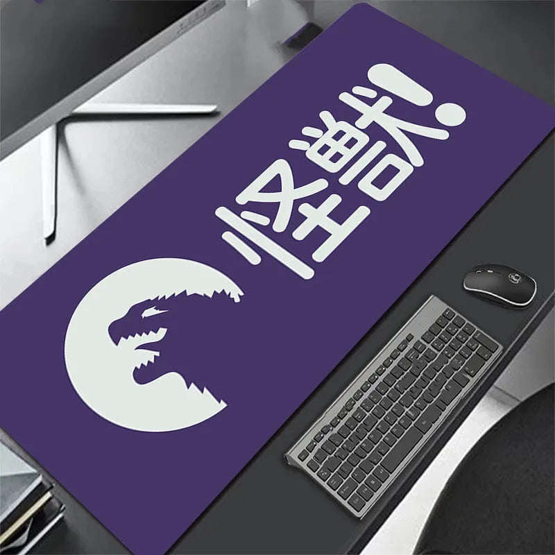 All black extra long mouse pad with precision overlock stitching on a desk