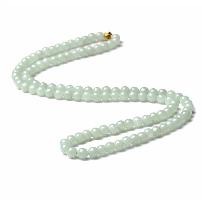 Adjustable natural jade bead necklace with 6.5mm round white and green beads on a long chain.