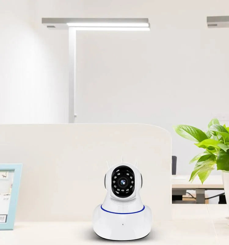 White wireless dome security camera with a 3.6mm lens for HD night vision monitoring.