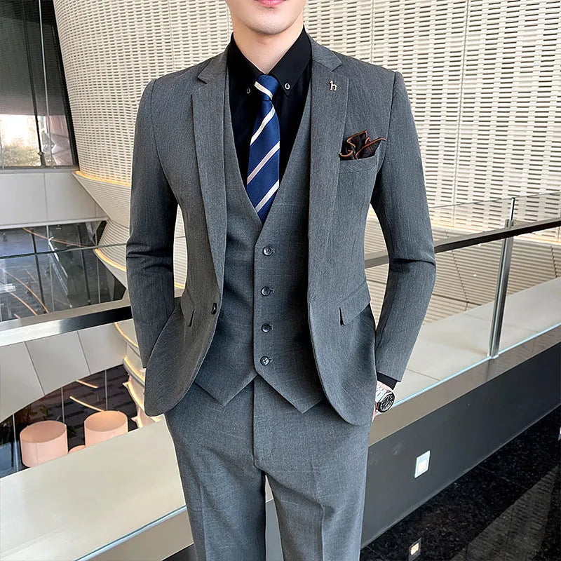 Slim fit men's business suit in British style available in black and dark grey colours
