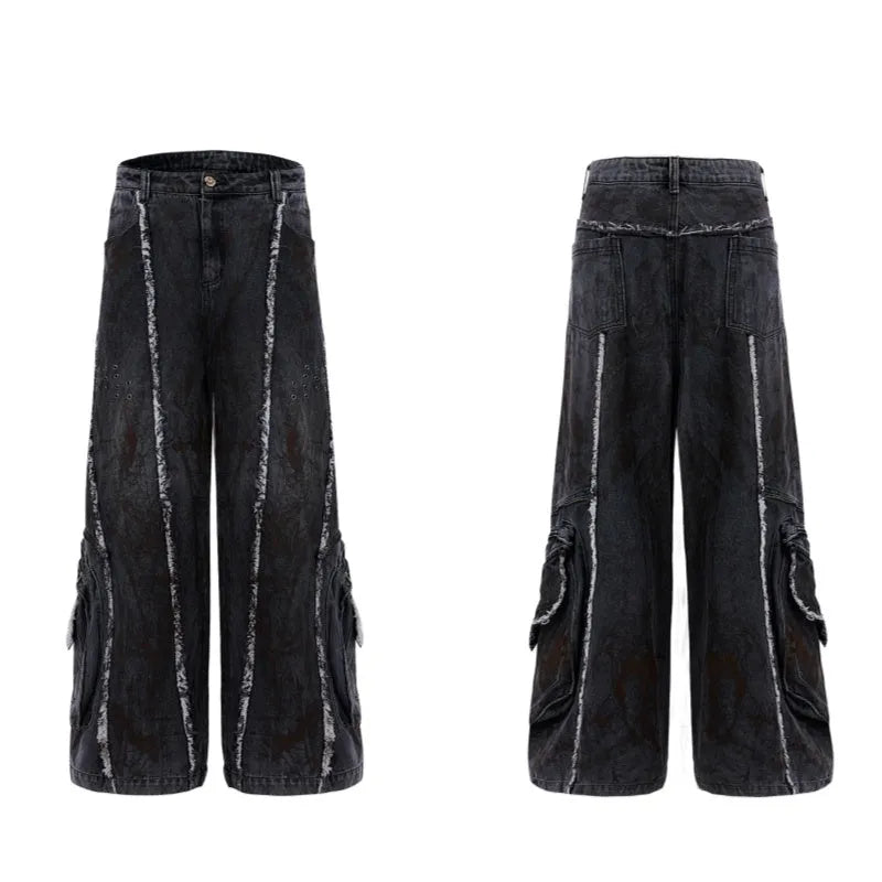 Distressed black gradient denim coat with padded shoulders and matching trousers laid flat
