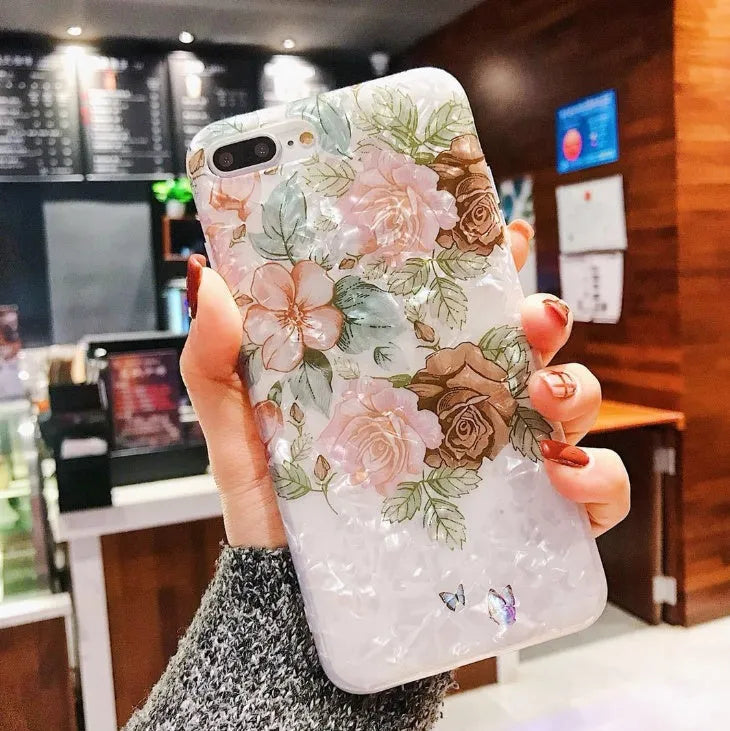 Dream Shell soft TPU iPhone case with rose flower pattern in brown, purple, or white.