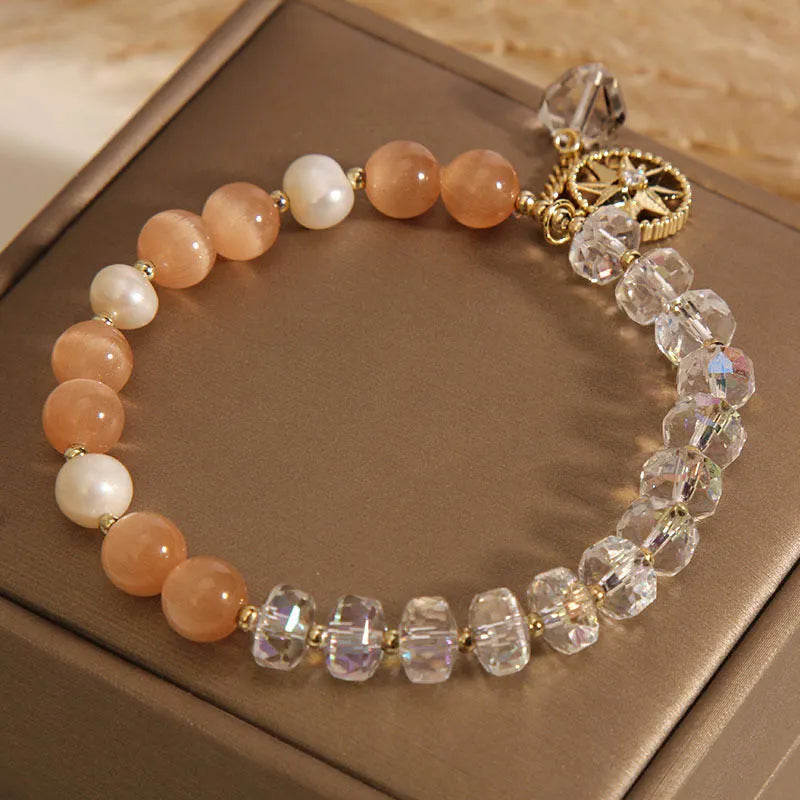 Orange women's bracelet with eight Awn star design featuring opal crystal and artificial gemstone inlay on gold-plated metal