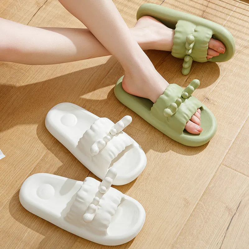 Deer horn design EVA flip flop slippers in light yellow, showing hollow out pattern and non-slip sole.