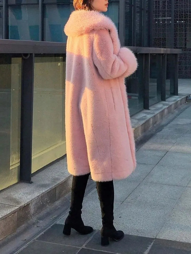 Women's thick grey faux rabbit fur mid-length coat with a fur collar.