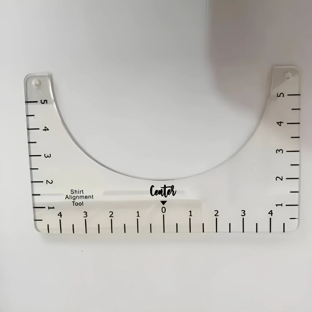 Transparent acrylic sewing ruler measuring 10 by 6 inches for T-shirt patch alignment