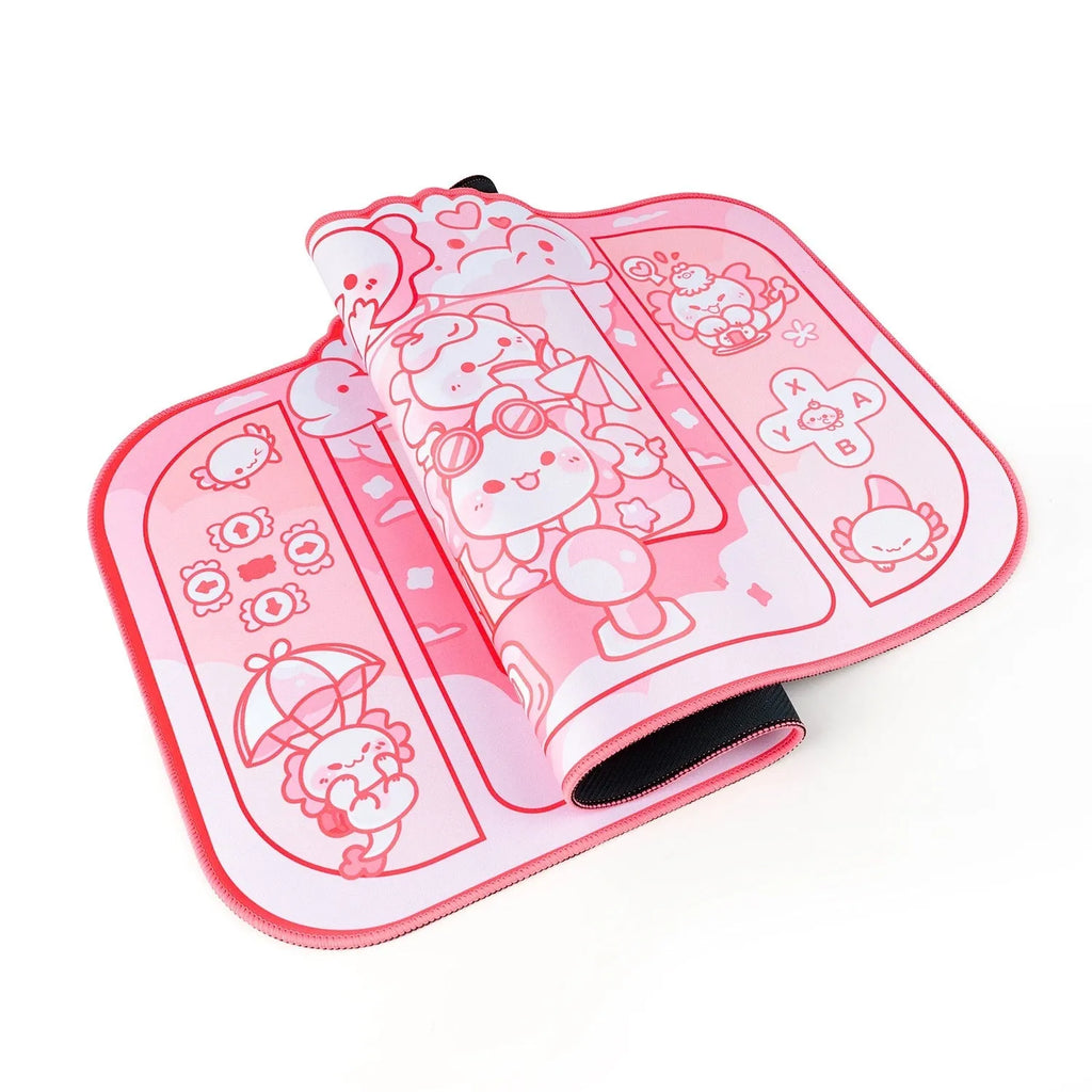 Large rectangular cloth mouse pad with hexagonal dragon crane machine cartoon design, shown on a desk.