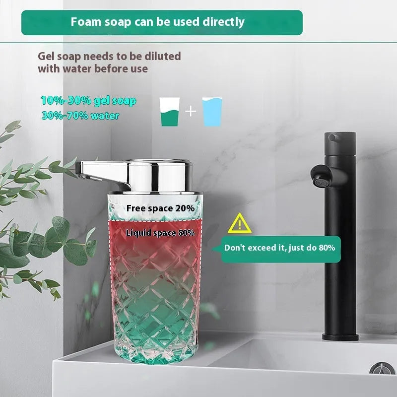 Silver automatic sensor soap dispenser with type-c charging port on a bathroom counter.