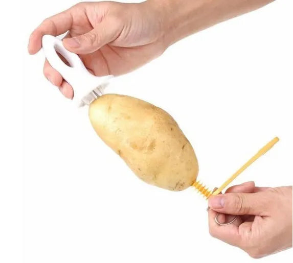 Potato cutter slicer with stainless steel blade and ABS resin handle, 11x4cm, cutting a potato into chips