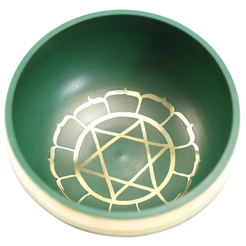 Small handmade Himalayan singing bowl in blue colour, measuring 8 cm, for meditation and percussion.