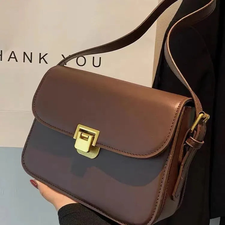 Soft black PU leather women's small square cross-body bag with a shoulder strap