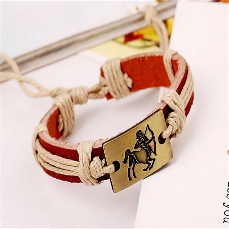 12 constellation alloy bracelet set with copper leather and braided hemp rope on a neutral background