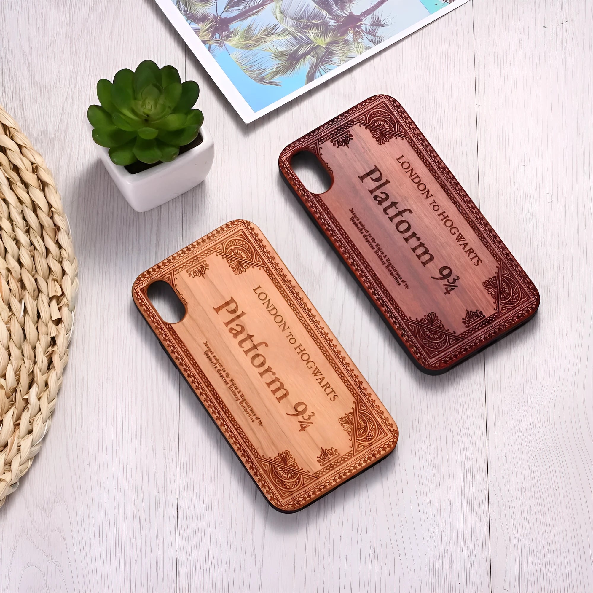 Wooden iPhone case with laser-engraved floral pattern and a black TPU bumper, shown on an iPhone.