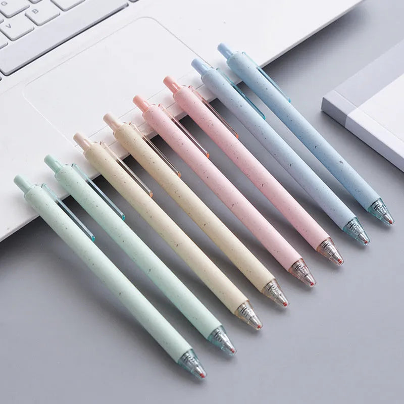 Set of 12 push-type gel pens in beige, blue, green, and pink with 0.5mm black tips.